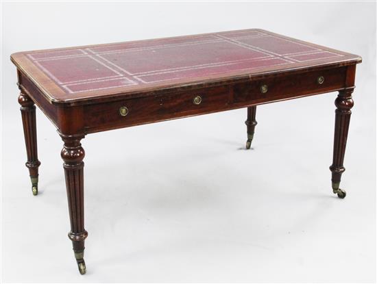 A Victorian mahogany partners writing table, by Holland & Sons, 5ft x 2ft 11.5in. x 2ft 6in.